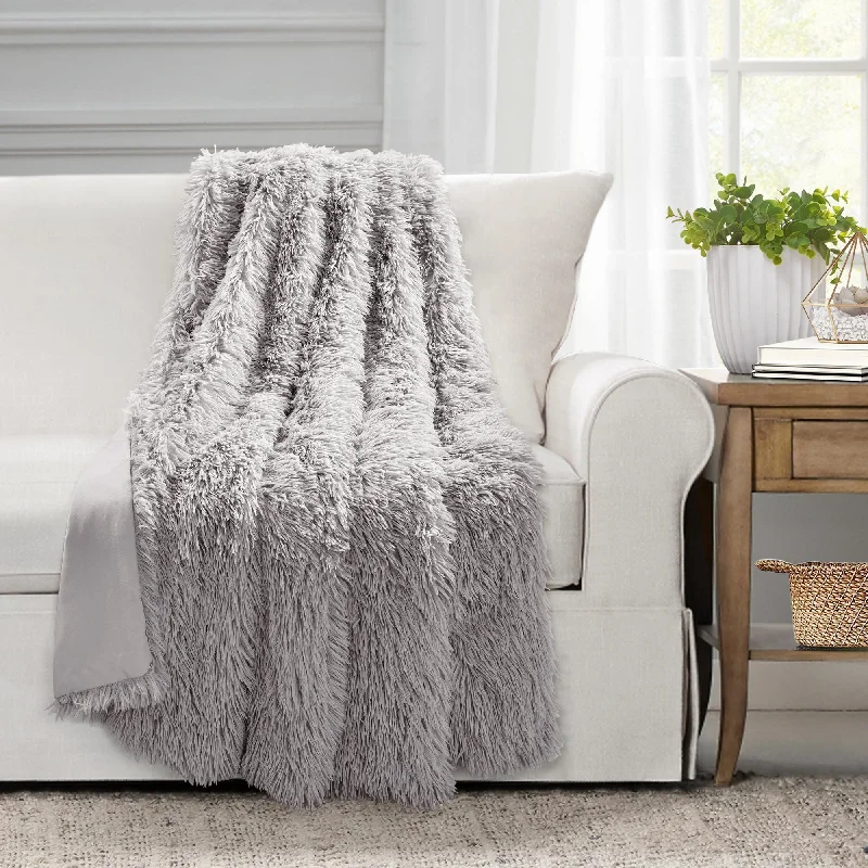 Cotton blankets for breathability and a lightweight feelEmma Faux Fur Throw