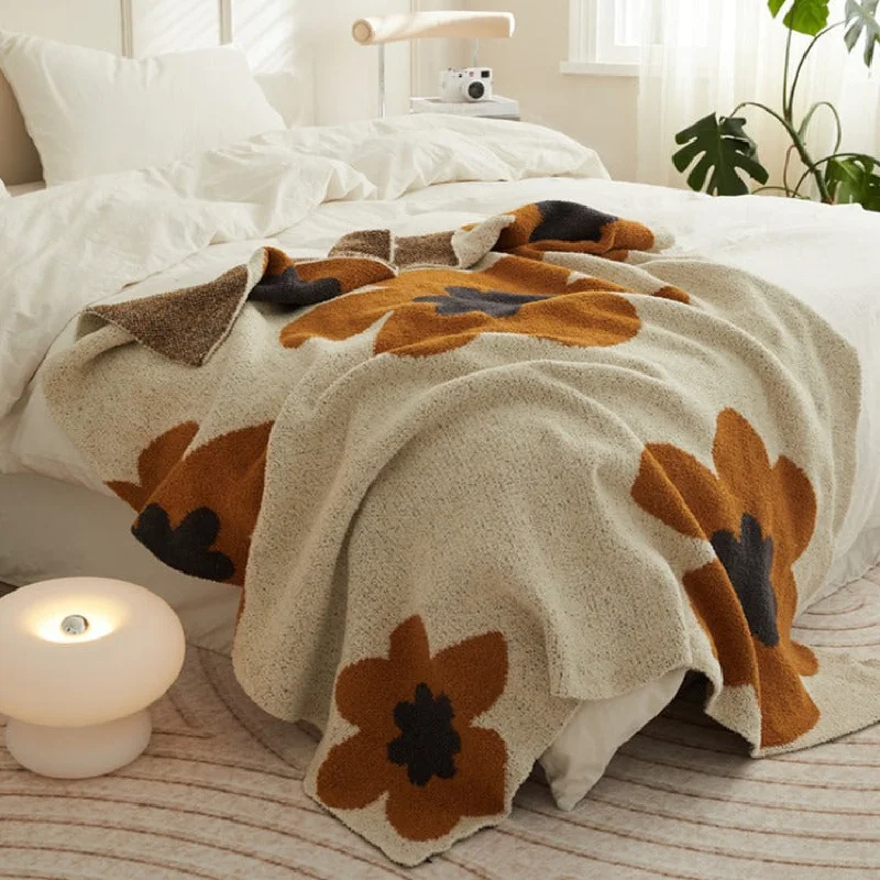 Cashmere blankets for ultimate softness and luxuryCozy Earth Tone Floral Blanket / Orange + Beige