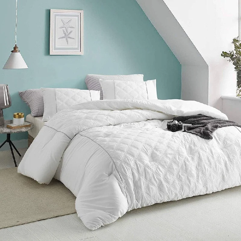 Microfiber - filled comforters that are lightweight and easy to care forLe Blanc Textured Bedding - Oversized Comforter