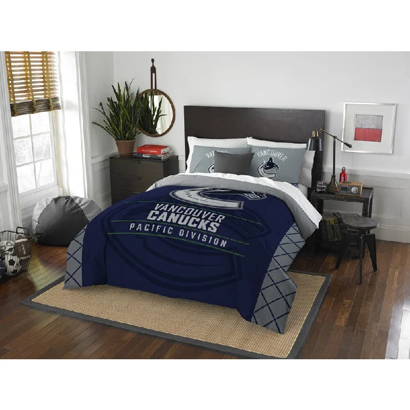 Goose down comforters known for their superior quality and insulationThe Northwest Co NHL Vancouver Canucks Draft Full/Queen 3-piece Comforter Set