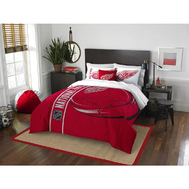 Synthetic - filled comforters like polyester for affordability and hypoallergenic propertiesThe Northwest Company Official NHL Detroit Red Wings Full Applique 3-piece Comforter Set